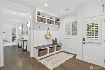 Mud room has entrance to front of house and is just off of attached 3 car garage. Flows perfectly into laundry room.