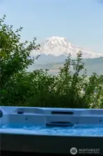 Watching sunsets from the hot tub will be your happy place for sure!