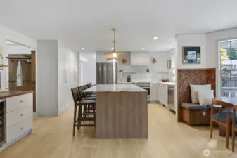 The completely new kitchen is open, bright, and beautifully reimagined from top to bottom—featuring all-new LED lighting, cabinetry, fixtures, hardware, flooring, paint, and millwork. Every detail has been thoughtfully updated to create a cohesive, light-filled space that feels both fresh and inviting.