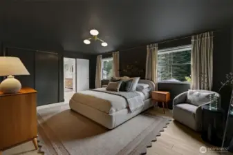 A calming primary suite retreat, designed as a true getaway—featuring a spacious layout, dual closets, and a private ensuite. Soft, moody tones and peaceful views create a relaxing escape at the end of each day.