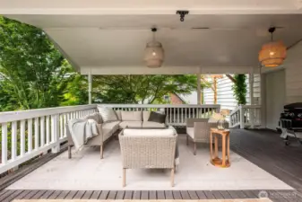 A generous covered outdoor living room offering expansive space for seating and effortless year-round entertaining. Designed with both comfort and flexibility in mind, the deck is reinforced for a hot tub and already wired and plumbed—ready to elevate into your own private spa retreat.