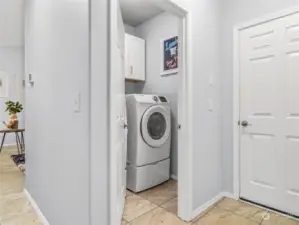 Laundry room with storage. Washer and dryer stay!