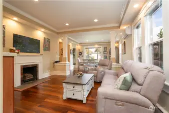 Living room has wood burning fireplace.