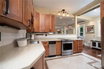 Beautiful cabinetry and recycled glass/quartz counters.