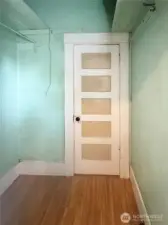 Spacious walk-in closet with bathroom entry