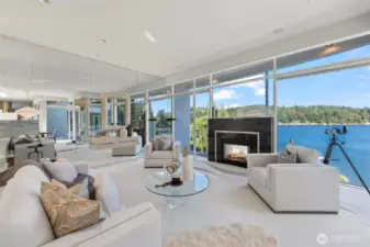 From sunrise sparkles to golden sunsets over the deepwater dock, this space is the heart of the home’s architectural magic