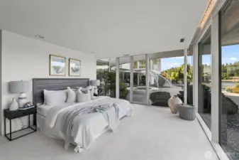 This guest room feels like a palatial suite of light and views.  Each bedroom has it's own french doors to the patio making it easy to step out for a morning coffee by the pool.
