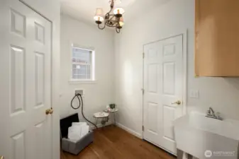 Generous size walk-in pantry, laundry room with laundry sink