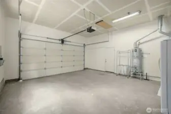 Extra tall two car garage with stair access loft for extra storage
