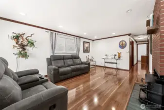 Living Room with Woodstove & Brazilian Fruitwood Floors