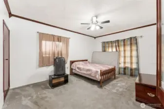 Primary Bedroom with French doors & ceiling fan