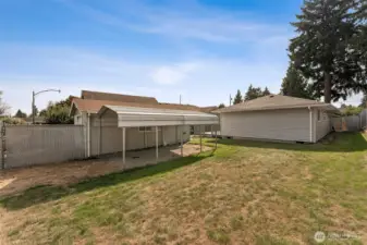 Large Backyard with shed, canopy, and detached 1-car garage