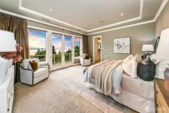 Primary bedroom on main floor with balcony