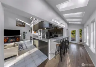 Sky lights line the entrance of the home