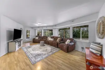 Lower Level is a second living area private exterior entrance, full kitchen, bath and 2 bedrooms.