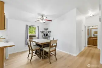 Dining area with natural light and easy flow to adjacent living spaces.