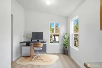 Virtually staged nook showcasing a versatile space ideal for a home office or study.