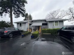 The new front of the building. New roof, new paint, new rails coming.