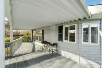 Quiet riverfront setting where the water and trees create a peaceful outdoor retreat.