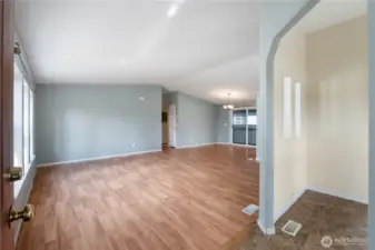 Bright and comfortable living room with plenty of natural light and a welcoming atmosphere.