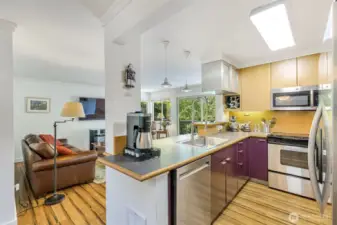 Hallway to sleeping area and bathroom to the right