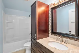 Full bath close to the bedrooms. Skylight above for natural light. Tastefully appointed.
