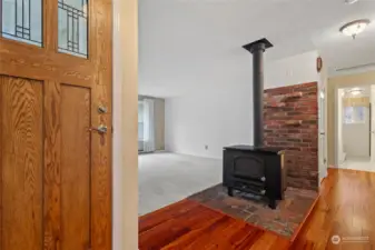 View of living room and hall from front entrance