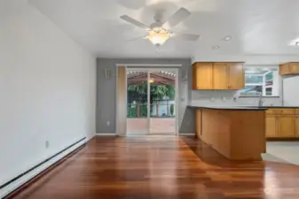 Dining Room, Sliding glass door opens to partially covered wood deck