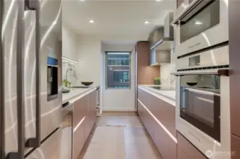 You really must see this kitchen in person to experience the quality of the soft close & open cabinets & the incredible stone throughout.