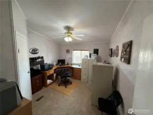 Bedroom 2 is set up as a office with a walk in closet