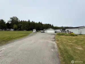 Tons of parking and usable property home sits way off main road