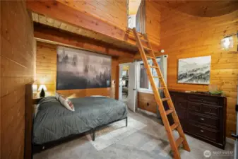 Primary bedroom on the 3rd floor. Two of the bedrooms on the 3rd floor have access to the "eagle's nest" loft, and each of the two has its own full ensuite bathroom.