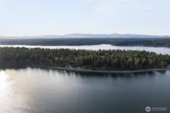 Expansive waterfront  surround this private, wooded island-offering 3.5 miles of private beaches & 5.5 miles of trails. Welcome to Harstene Pointe.