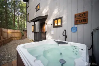 This hot tub completes the perfect blend of indoor-outdoor living for a relaxing evening. Listen to the sounds of the wind in the trees and the birds chirping.
