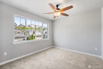 Upstairs bedroom facing front of home