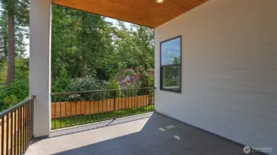Covered deck is ideal for year-round enjoyment!