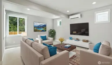 Lower Level Rec Room: blast the volume to your heart's content and no disturb others on the upper floors! Virtually staged.