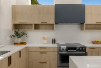 Culinary kitchen with Bosch & Whirlpool stainless appliances &  quartz counters.