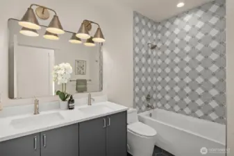 Guest bath with striking patterned tile.