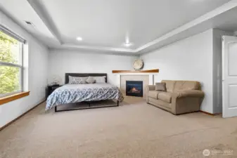 Step through the French doors into this truly spacious Primary Suite...