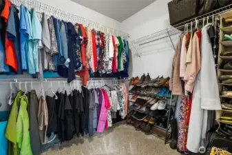 Plenty of space to stay organized in the Primary Suite walk-in Closet with more room off to the left in this photo.