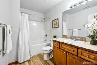 The upstairs/Main Bath is located by the Bedrooms.