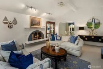 The living room seamlessly connects to the dining area and kitchen, offering an open, airy layout ideal for both everyday living and hosting. Thoughtful details and designer finishes complement the home’s inviting Northwest aesthetic.