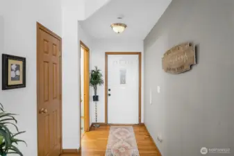 Entry Hall way, powder room and coat closet.