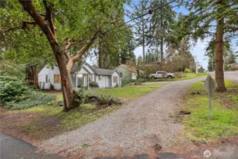 Circular driveway with even more parking on the side