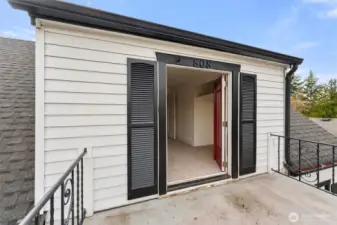 Main house balcony looking into bedroom