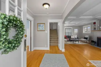 Upon entering the home, you are greeted with the boxed beam ceiling.