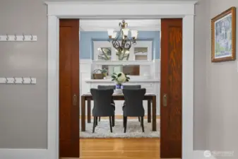 Charming pocket doors that can close off the dining room.