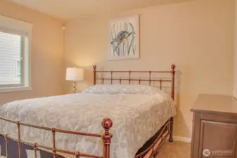 SECOND BEDROOM (from bedroom door): Carpeted, East-Facing Window with 2" Horizontal Vinyl Blinds; Comfortably Fits Queen-Size Bed and Furniture