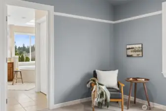 Primary sitting area opens to 5-piece bath